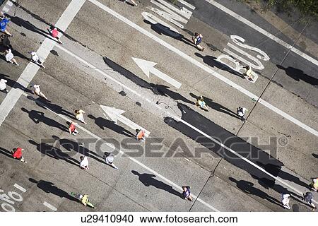 Stock Image - USA, New York City, New York City Marathon as seen from above. Fotosearch