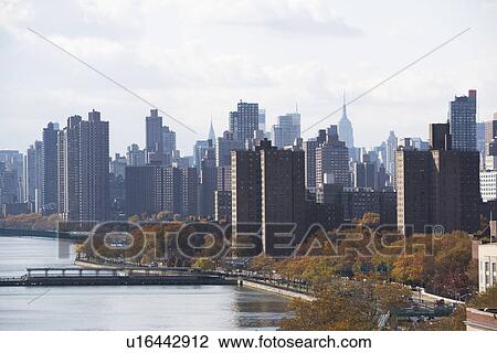 USA, New York City, View of lake in Central Park and Manhattan skyline View Large Photo Image Stock Image - USA, New York City, View of lake in Central Park and Manhattan skyline. Fotosearch