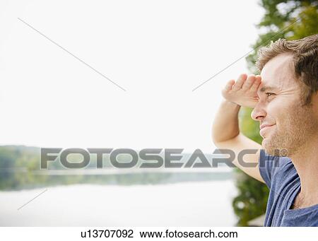 USA, New York, Putnam Valley, Roaring Brook Lake, Close up of man looking at view View Large Photo Image Stock Image - USA, New York, Putnam Valley, Roaring Brook Lake, Close up of man looking at view. Fotosearch