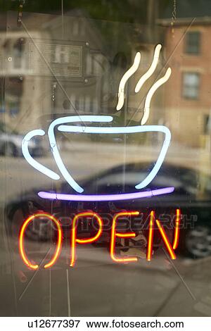 Stock Photo - USA, New York State, Neon sign in cafe window. Fotosearch
