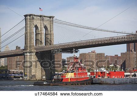 USA, New York State, New York City, Barge under Brooklyn Bridge View Large Photo Image Picture - USA, New York State, New York City, Barge under Brooklyn Bridge. Fotosearch