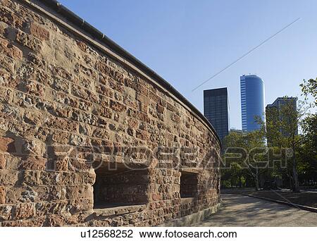 Stock Image - USA, New York State, New York City, View of Clinton Castle with skyscrapers on background. Fotosearch