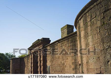 Stock Image - USA, New York State, New York City, View of Clinton Castle with skyscrapers on background. Fotosearch
