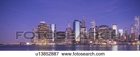 Stock Photo - USA, New York State, New York City, City skyline at dusk. Fotosearch