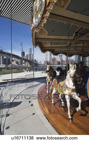 USA, New York State, New York City, Merry go-round near Brooklyn Bridge View Large Photo Image Stock Photo - USA, New York State, New York City, Merry go-round near Brooklyn Bridge. Fotosearch
