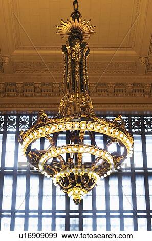 Stock Photo - USA, New York State, New York City, Chandelier in Grand Central Station. Fotosearch