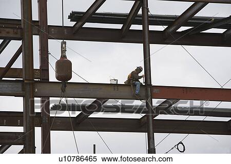 USA, New York State, New York City, Construction worker on crane View Large Photo Image Stock Photography - USA, New York State, New York City, Construction worker on crane. Fotosearch