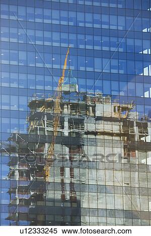 USA, New York State, New York City, Crane reflected in office building View Large Photo Image Stock Photography - USA, New York State, New York City, Crane reflected in office building. Fotosearch