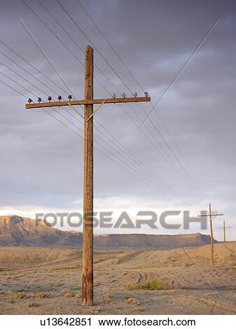 Stock Image - USA, Utah, Desert landscape with power lines. Fotosearch
