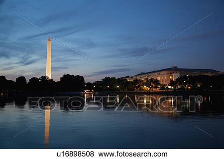 USA, Washington DC, Washington Monument reflecting in water at dusk View Large Photo Image Stock Photo - USA, Washington DC, Washington Monument reflecting in water at dusk. Fotosearch