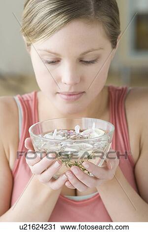 Woman enjoying aromatherapy View Large Photo Image Stock Image - Woman enjoying aromatherapy. Fotosearch