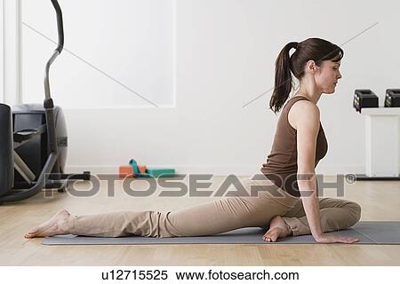Stock Photography - Woman in yoga pose. Fotosearch