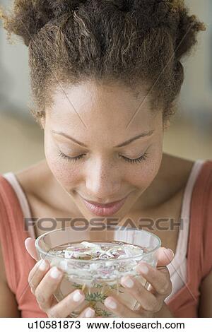 Woman relaxing with aromatherapy View Large Photo Image Stock Image - Woman relaxing with aromatherapy. Fotosearch