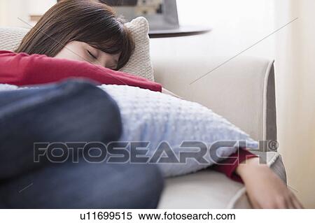 Woman sleeping o sofa View Large Photo Image Stock Photography - Woman sleeping o sofa. Fotosearch