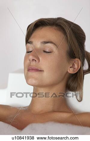 Stock Photo - Woman taking bath. Fotosearch