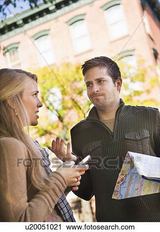 Young couple visiting city View Large Photo Image Stock Image - Young couple visiting city. Fotosearch