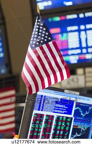 American flag on trading desk View Large Photo Image Picture - American flag on trading desk. Fotosearch