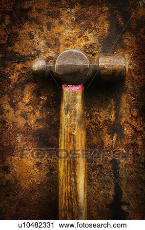 Stock Image - Antigue hammer, studio shot. Fotosearch