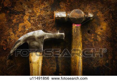 Stock Photograph - Antigue hammers, studio shot. Fotosearch