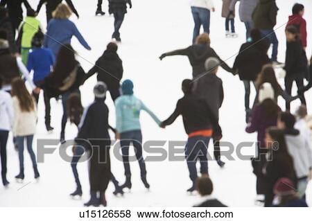 blurred motion of people ice-skating View Large Photo Image Stock Photo - blurred motion of people ice-skating. Fotosearch