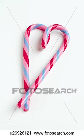 Candy canes in heart shape, studio shot View Large Photo Image Stock Image - Candy canes in heart shape, studio shot. Fotosearch