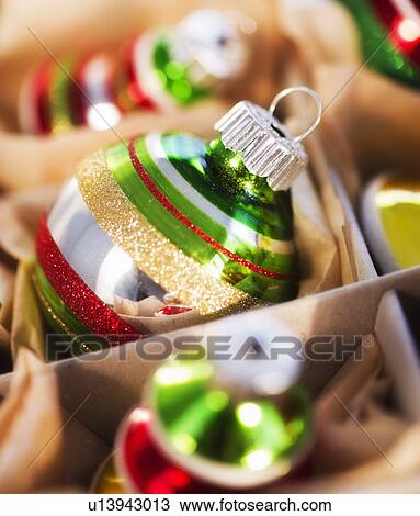 Christmas baubles in box View Large Photo Image Stock Image - Christmas baubles in box. Fotosearch