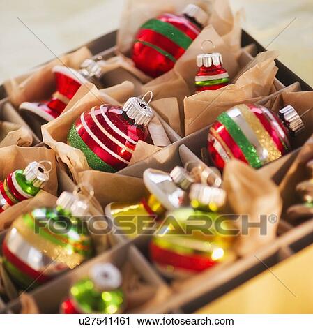 Christmas baubles in box View Large Photo Image Stock Image - Christmas baubles in box. Fotosearch