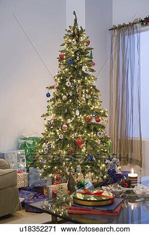 Christmas tree in living room View Large Photo Image Stock Image - Christmas tree in living room. Fotosearch