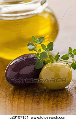 Close-up of black and green olives, studio shot View Large Photo Image Stock Image - Close-up of black and green olives, studio shot. Fotosearch