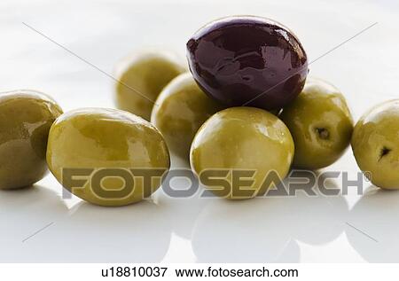 Close-up of black and green olives, studio shot View Large Photo Image Stock Photo - Close-up of black and green olives, studio shot. Fotosearch