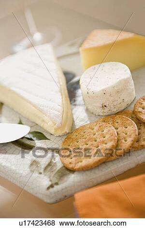 Close-up of cheese and crackers View Large Photo Image Stock Photo - Close-up of cheese and crackers. Fotosearch