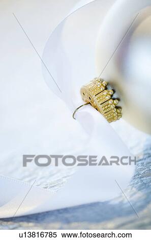 Close-up of Christmas ball with ribbon, studio shot View Large Photo Image Stock Photography - Close-up of Christmas ball with ribbon, studio shot. Fotosearch