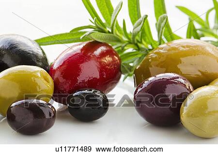 Stock Photo - Close-up of various olives, studio shot. Fotosearch