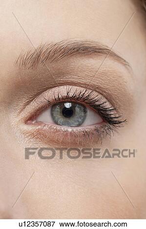 Stock Photo - Close up of woman's eye, studio shot. Fotosearch