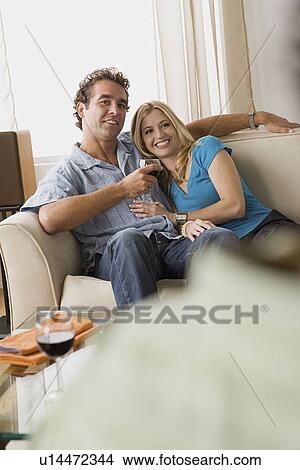 Couple at home party View Large Photo Image Picture - Couple at home party. Fotosearch