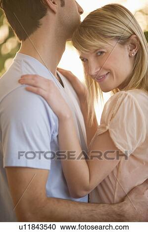 Stock Image - Couple embracing . Fotosearch