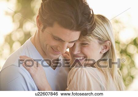 Stock Photograph - Couple embracing . Fotosearch