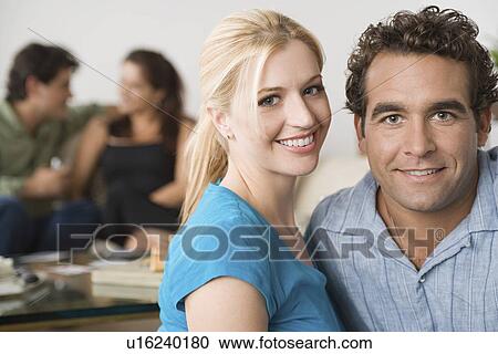 Couples at home party View Large Photo Image Stock Image - Couples at home party. Fotosearch