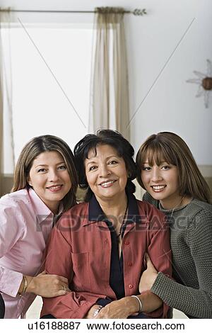 Family portrait of three women View Large Photo Image Stock Photo - Family portrait of three women. Fotosearch
