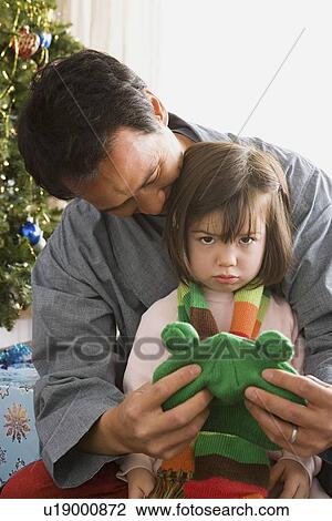 Father and daughter at Christmas tree View Large Photo Image Stock Image - Father and daughter at Christmas tree. Fotosearch