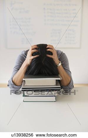 Frustrated woman in front of board with equations View Large Photo Image Stock Photograph - Frustrated woman in front of board with equations. Fotosearch