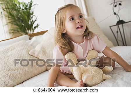 Girl with teddy bear View Large Photo Image Picture - Girl with teddy bear. Fotosearch