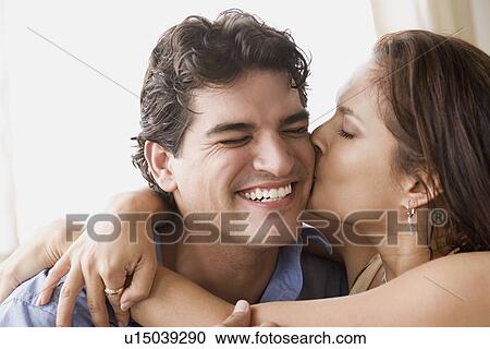 Stock Image - Happy mid adult couple. Fotosearch