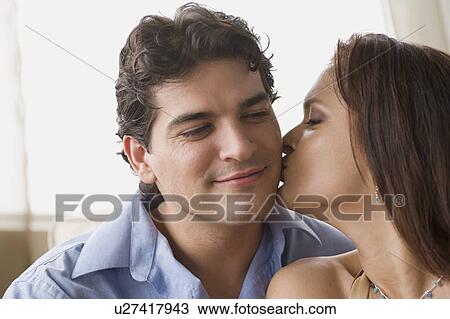 Stock Image - Happy mid adult couple. Fotosearch