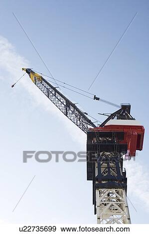 Stock Photo - Low angle view of crane. Fotosearch