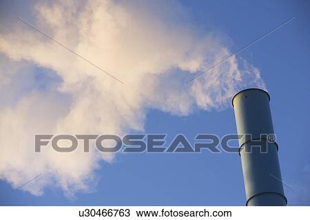 Low angle view of smoke stack View Large Photo Image Stock Image - Low angle view of smoke stack. Fotosearch