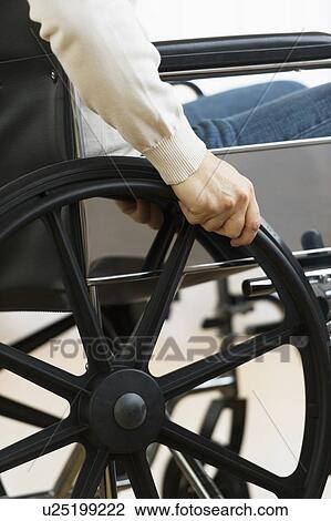 Man on wheelchair View Large Photo Image Stock Image - Man on wheelchair. Fotosearch