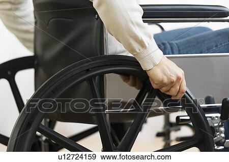 Man on wheelchair View Large Photo Image Stock Photo - Man on wheelchair. Fotosearch