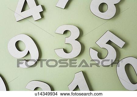 Picture - Numbers on white background, studio shot. Fotosearch