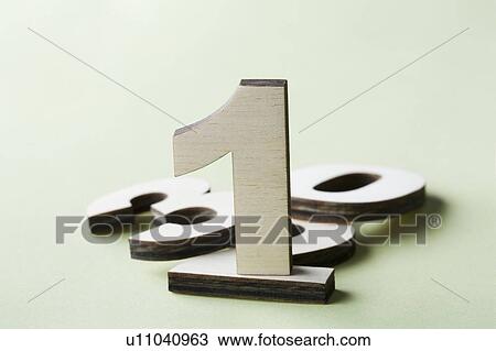 Stock Image - Numbers on white background, studio shot. Fotosearch